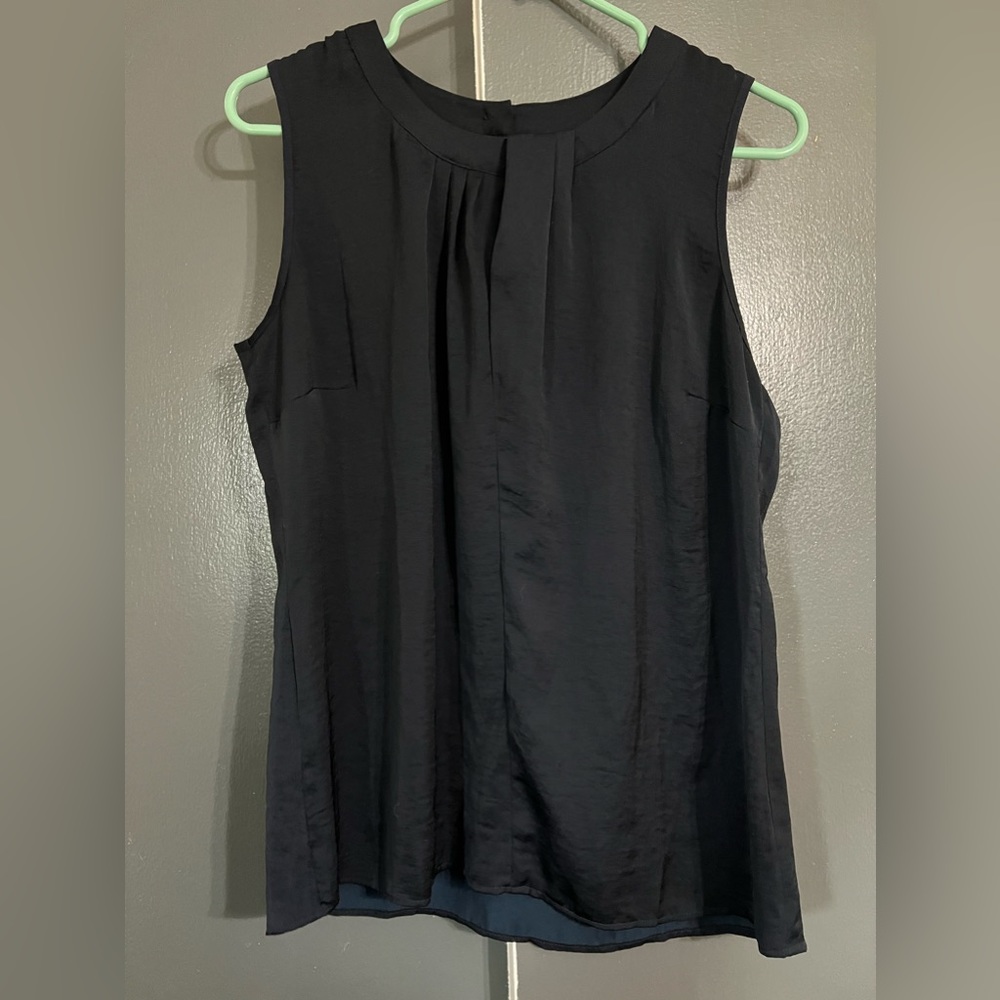 this is a blouse. the brand is Cabi, size small, color is dark navy blue/black.